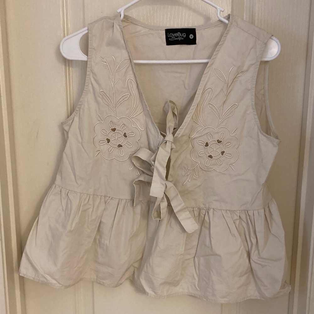 Cream Sleeveless Embroidered Top